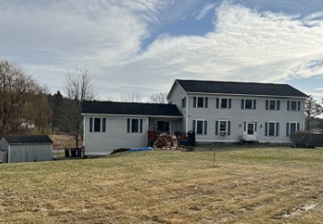 103 Court Street - two-story residence with addition and outbuildings on a large lot